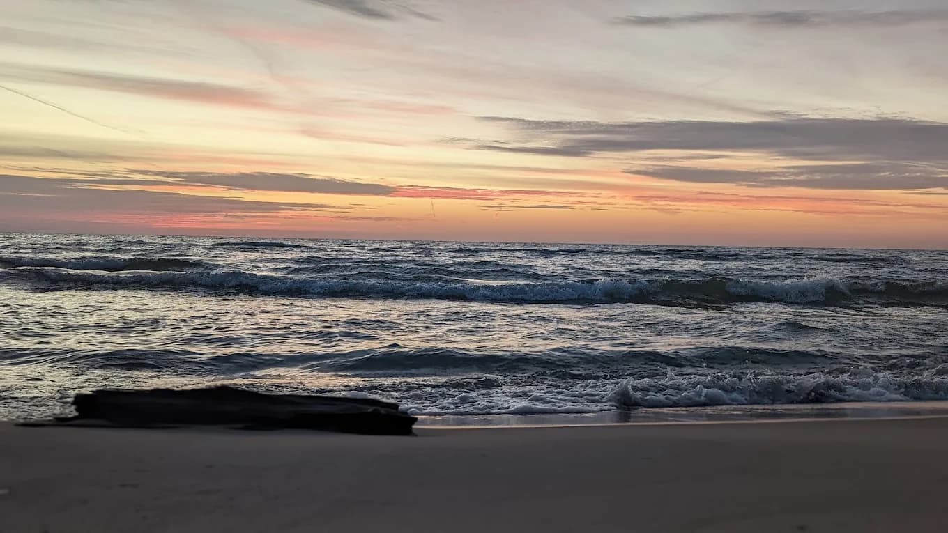 Golden sunset over Lake Huron at Oscoda Lakeside Hotel